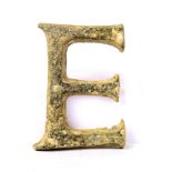 Roman Imperial Bronze letter "E", 1st-3rd Century AD