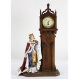 Gothic style carved figural clock