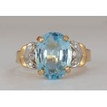 Blue topaz, diamond, 14k yellow gold ring