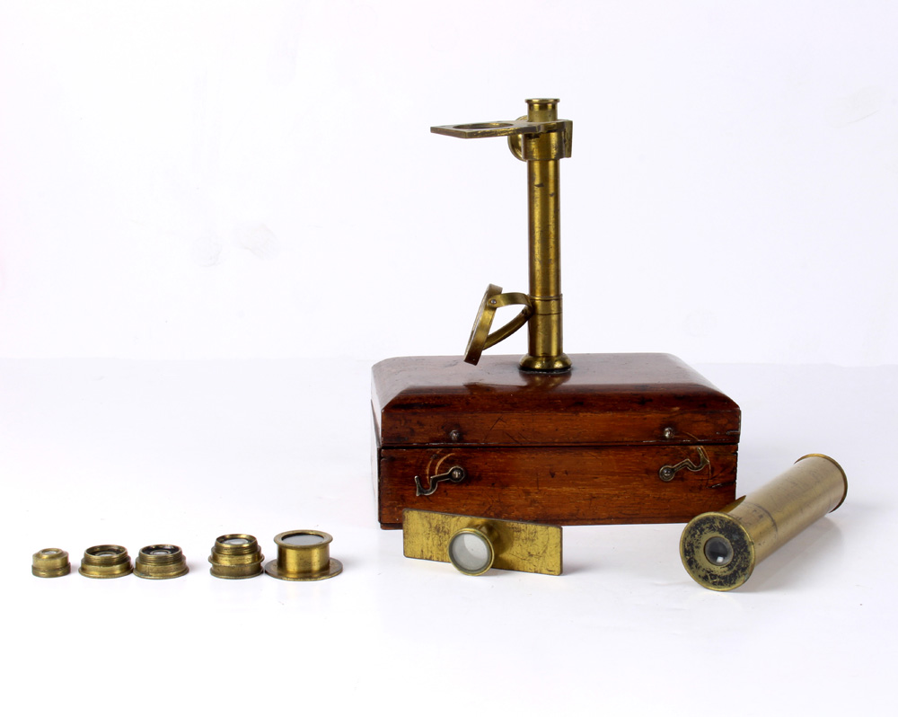 Brass traveling microscope, rising on a hinged lid wooden box