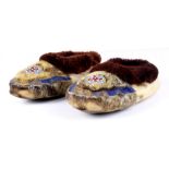 Pair of Eskimo or Athabaskan children's moccasins