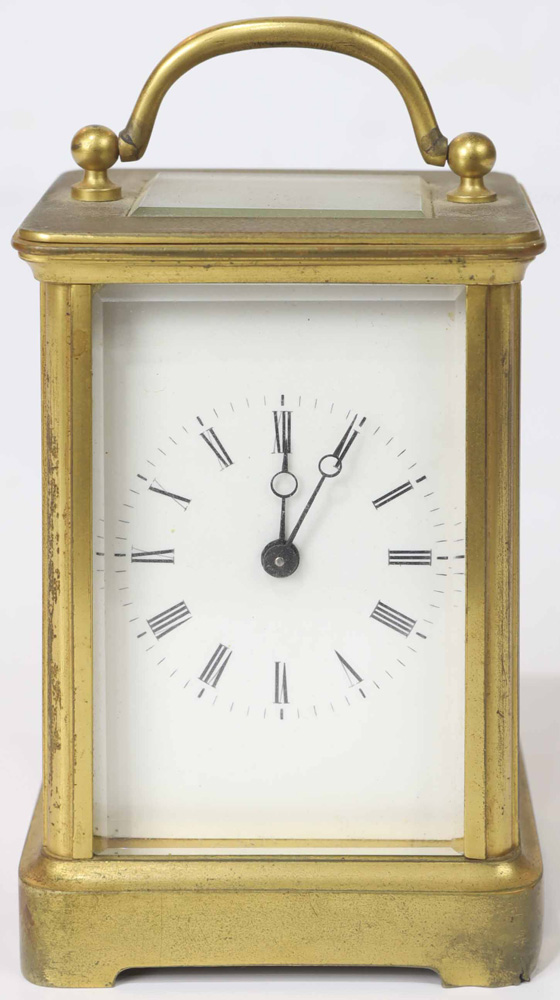 French carriage clock, the rectangular brass case fitted with beveled glass panels