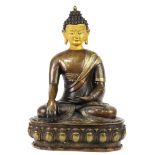 A gilt copper alloy figure of seated Buddha