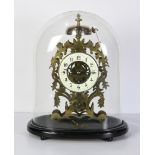 Continental mystery brass skeleton clock, fitted with a glass globe