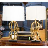 A contemporary pair of lamps, each having gilt double spherical bases, 28"h