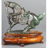 A Chinese Spinach Hardstone Carved Horse