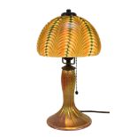 A Lundberg Studios iridescent art glass lamp