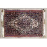 A Persian Hamadan carpet