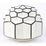 An Art Deco milk glass ceiling mount lighting shade