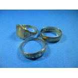 A 22ct gold wedding band and two 18ct gold rings, approx. weight 10.9g