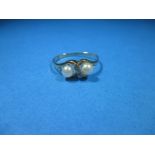 A 9ct yellow gold ring set with 3 diamonds and 2 pearls, approx. size N