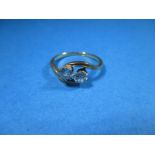 An 18ct gold 2 stone diamond ring, approx. size M