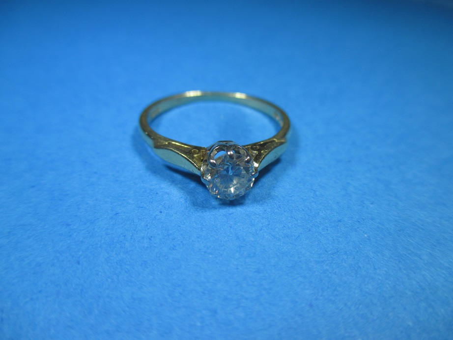 An 18ct yellow gold diamond solitaire ring, the stone measuring approx. 4.9mm Ring size M ½