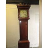 An early 19th century mahogany longcase clock with painted dial, striking on a bell