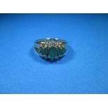 A 14ct yellow gold diamond and emerald ring, approx. size N