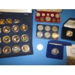 A quantity of collectors coins to include silver proof examples