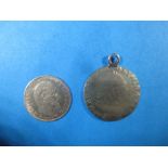 An 1860 5 Franc coin and a George III pendant