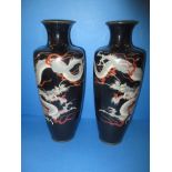 A pair cloisonné vases each depicting a Japanese 3 clawed dragon