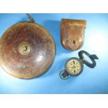 A military compass by Short & Mason Ltd dated 1901 and a leather bound tape