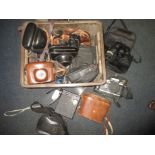 A quantity of vintage cameras a binoculars