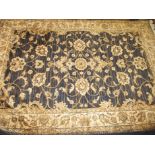 A vintage wool and silk rug, approx size 220x160cm