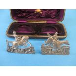 An unusual pair of sterling silver table decorations, in the form of hunting horses, in original