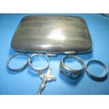 A silver cigarette case and silver rings