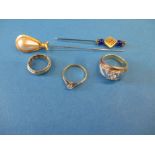 An 18ct gold and diamond ring, 2 other rings and 2 hat pins