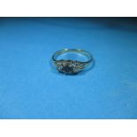 A 9ct gold diamond and sapphire ring, approx. ring size P