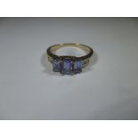 A 9ct gold 3 stone Tanzanite ring, approx size P