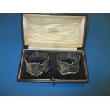 A boxed pair of 1930s sterling silver napkin rings