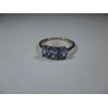 A 9ct gold 3 stone Tanzanite ring, approx size O 1/2