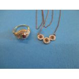 A gold dress ring marked 15ct, approx weight 5.1g and a silver necklace