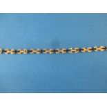 An 18ct gold diamond and sapphire bracelet