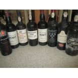 8 Bottles of cellar stored port. Register and bid at https://clareauction.com/ab