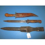 A WWII Bayonet dagger marked 43asw and a sheathed knife