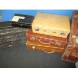 A quantity of vintage leather cases and metal trunks