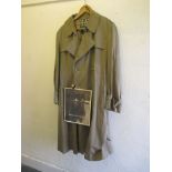 A Burberry trench coat , actually worn by Lord Lichfield for a promotional broch