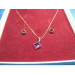 A 9ct gold and amethyst necklace and earring set