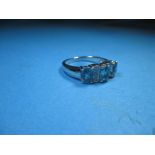 A 9k Blue Zircon and diamond white gold ring