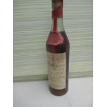 A 1947 bottle of Armagnac, cellar stored. Register and bid at https://clareaucti
