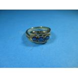 An 18ct gold sapphire and diamond ring, size O