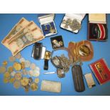 A quantity of interesting curios to include coins and watches
