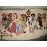 10 vintage puppets. Register and bid at https://clareauction.com/absentee-bid-fo