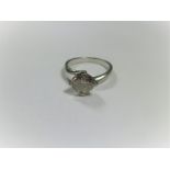 An 18ct white gold champagne diamond solitaire ring, the stone measuring approx