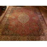 A vintage Axminster wool rug, approx 10ft 6in x 8ft 6in