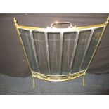 A brass and glass fire side spark screen