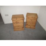 A pair of pine bedside cabinets