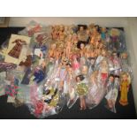 A very large quantity of vintage Sindy Dolls and clothing. Register and bid at h