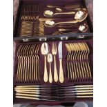 A gold plated canteen of cutlery